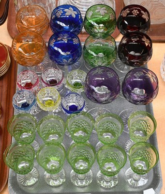 Lot 1144 - A Set of Ten Harlequin Coloured Hock Glasses,...