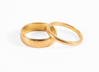 Lot 101 - Two 22 Carat Gold Band Rings, finger sizes...