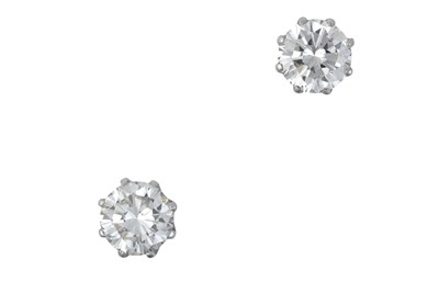 Lot 2359 - A Pair of Diamond Solitaire Earrings the round...