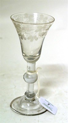 Lot 7 - A Wine Glass, circa 1740, the bell shaped bowl engraved with a band of fruiting vine on a...