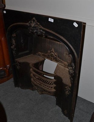 Lot 953 - A cast iron fire insert