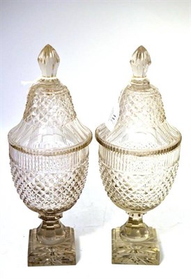 Lot 11 - A Pair of Glass Sweetmeat Vases and Covers, early 19th century, of urn shape, the domed covers with