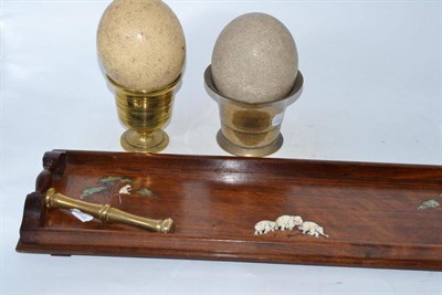 Lot 13 - Inlaid rosewood oblong tray, two ostrich eggs, a mortar and pestle and another mortar