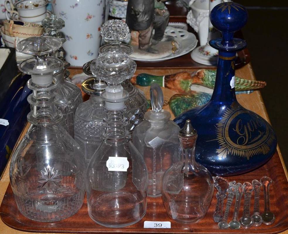 Lot 39 - A tray of decanters including a blue glass gin decanter, silver collared decanter, and a blue glass