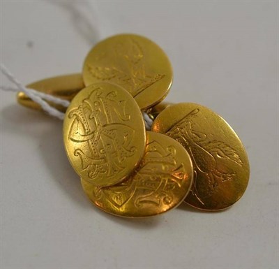 Lot 44 - A pair of 18ct gold cufflinks with crest engraved, and a pair of barrel shaped cufflinks...