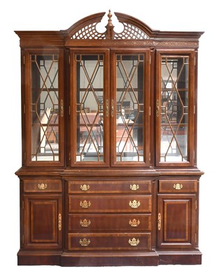 Lot 533 - A 20th Century Mahogany Breakfront Bookcase...