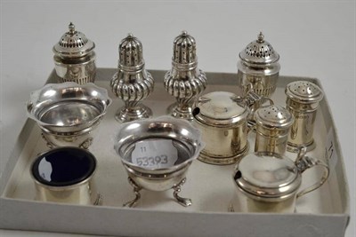 Lot 71 - Two pairs of silver pepperettes, five piece silver condiment set and a set of silver salts