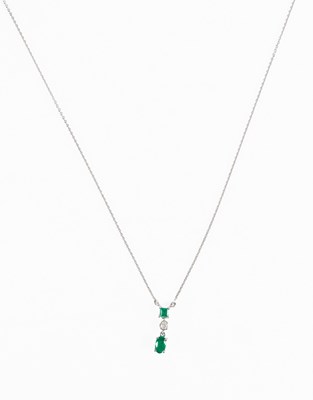 Lot 115 - An 18 Carat White Gold Emerald and Diamond...