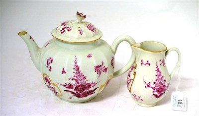 Lot 18 - A First Period Worcester Porcelain Fluted Teapot and Cover, circa 1770, painted in puce...