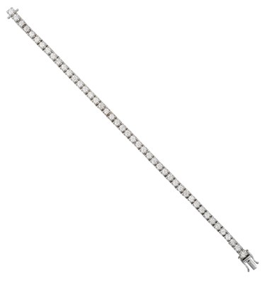 Lot 2212 - A 9 Carat White Gold Diamond Line Bracelet the...