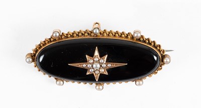 Lot 111 - An Onyx and Split Pearl Mourning Brooch, the...