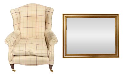 Lot 545 - A Modern Wing Armchair, with plaid upholstery...