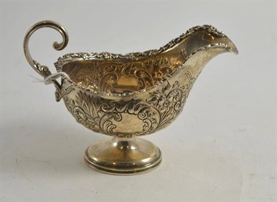 Lot 100 - Ornate Birks sterling sauceboat