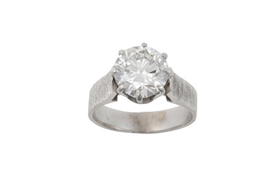 Lot 2297 - A Diamond Solitaire Ring the round brilliant...
