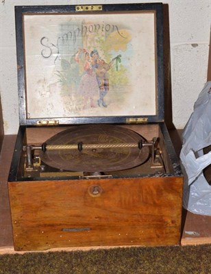 Lot 116 - A small walnut cased 'Symphonion' musical disc player, with 3inch steel comb movement (two...