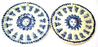 Lot 23 - A Pair of Pearlware Birth Tablets, circa 1790, of circular form, centred by a lion's mask boss...