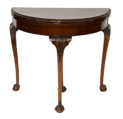 Lot 443 - A Mahogany Foldover Demi-Lune Card Table,...