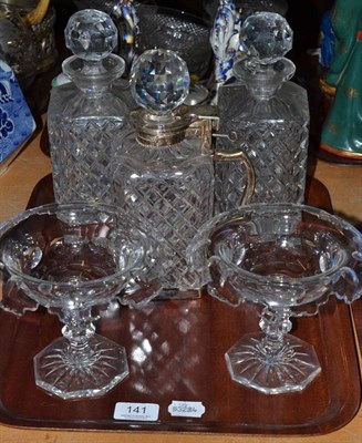 Lot 141 - Three decanters and a pair of glass tazzas