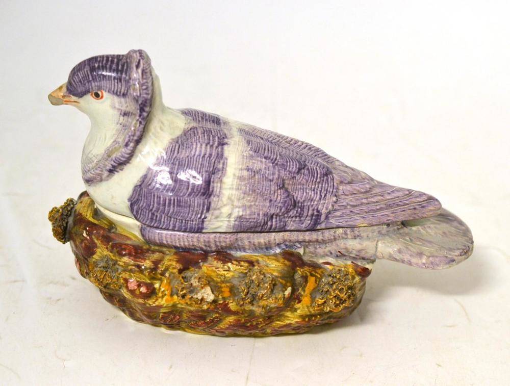 Lot 24 - A Pearlware Dove Tureen and Cover, circa 1790, naturalistically modelled and painted as the...