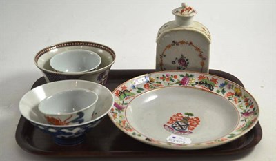 Lot 142 - An 18th century Chinese tea caddy, famille rose armorial dish, two bowls and two tea bowls