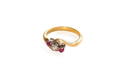 Lot 38 - A Synthetic Ruby and Diamond Three Stone Twist...