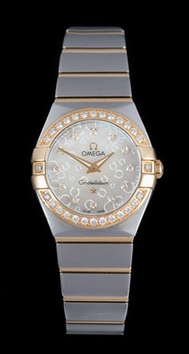 Lot 2418 - Omega: A Lady's Steel and Gold Diamond Set...
