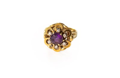 Lot 126 - An Amethyst and Diamond Cluster Ring, in the...