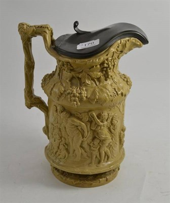 Lot 170 - 19th century relief decorated jug