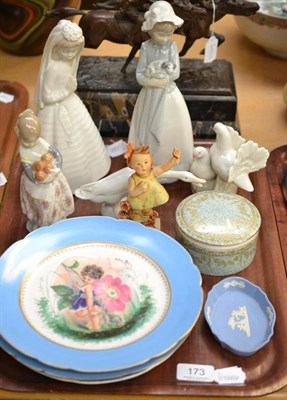 Lot 173 - A Lladro polychrome figure, a Lladro goose, three Nao figures, cabinet plates etc