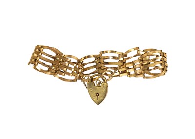 Lot 100 - A 9 Carat Gold Gate Link Bracelet, with a 9...