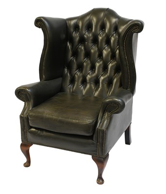 Lot 440 - A Reproduction Buttoned Green Leather Wing...