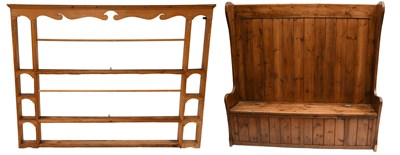 Lot 523 - A Pine Box Settle, with wing back, 158cm by...