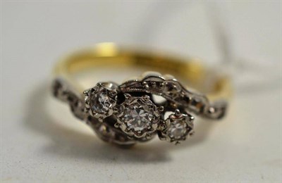 Lot 194 - A three stone diamond ring stamped '18ct'