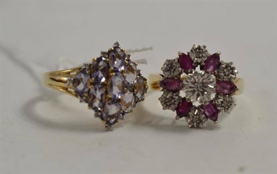 Lot 198 - A 9ct gold tanzanite cluster ring and a 9ct gold diamond and ruby cluster ring