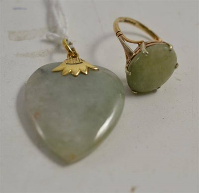 Lot 199 - A 9ct gold jade type ring and a heart shaped pendant