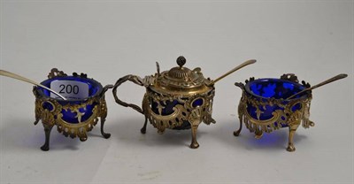 Lot 200 - A set of three pierced silver condiments