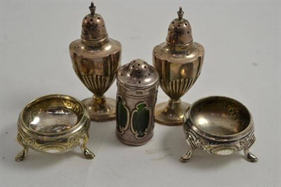 Lot 205 - A pair of silver pepperettes, a pair of plated salts and another silver pepperette