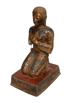 Lot 213 - A Thai Gilt Cast Metal Figure of a Disciple...