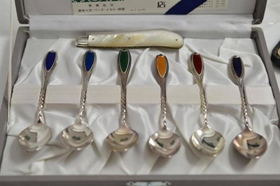 Lot 216 - A set of six Chinese white metal and enamel teaspoons, cased and a silver and mother of pearl fruit