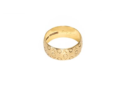 Lot 64 - A 9 Carat Gold Textured Band Ring, finger size...