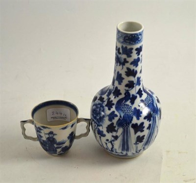 Lot 244 - Chinese blue and white bottle vase and a Chinese twin-handled cup (2)