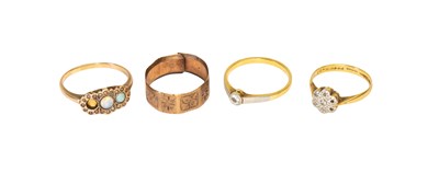 Lot 39 - Four Rings, comprising of a diamond cluster...