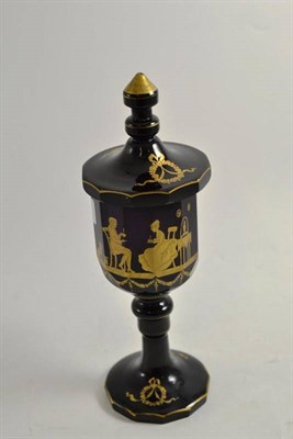 Lot 248 - 19th century Bohemian amethyst glass vase and cover decorated in gilt