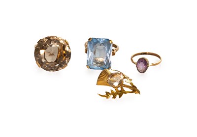 Lot 111 - A 9 Carat Gold Smoky Quartz Ring, finger size...