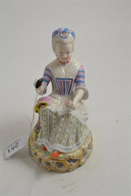 Lot 251 - A 19th century Meissen figure of a lady sitting on a chair