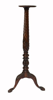 Lot 470 - A 19th Century Carved Mahogany Torchere, with...
