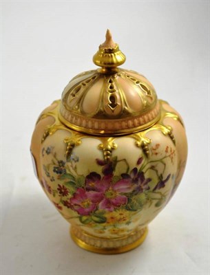 Lot 253 - A Royal Worcester blush ivory pot-pourri and cover (with inner liner) decorated with flowers, shape