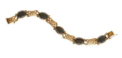 Lot 55 - A 9 Carat Gold Hematite Bracelet, comprising...