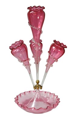 Lot 155 - A Cranberry Glass Four-Flute Epergne, raised...