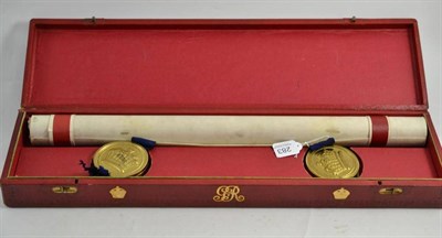 Lot 283 - A George V commemorative indenture with red leather case